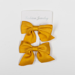 Bow hair clips yellow